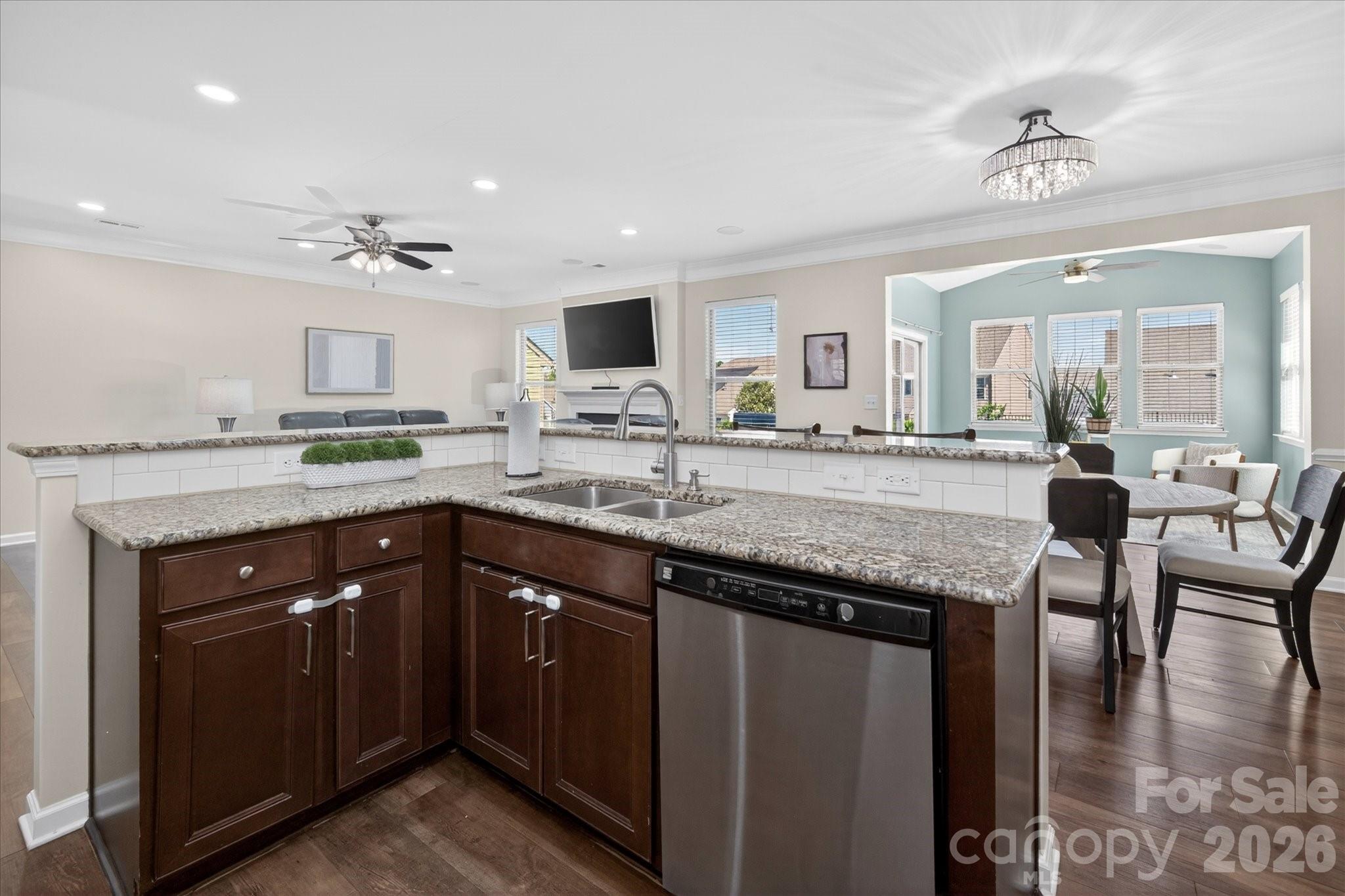 2032 Pinyon Lane Lancaster, SC 29720 - Photo 17 of 44 a kitchen with granite countertop stove sink and cabinets