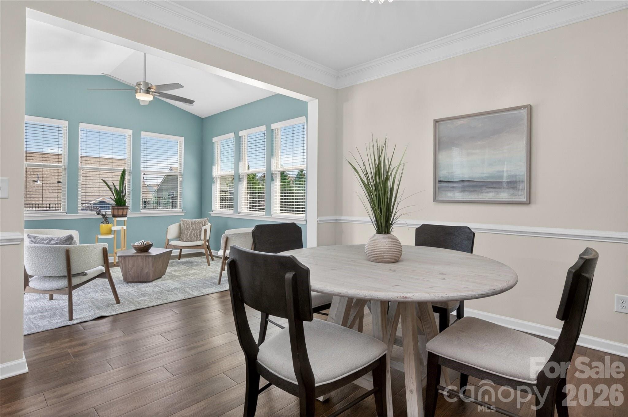 2032 Pinyon Lane Lancaster, SC 29720 - Photo 19 of 44 a view of a dining room with furniture window and wooden floor