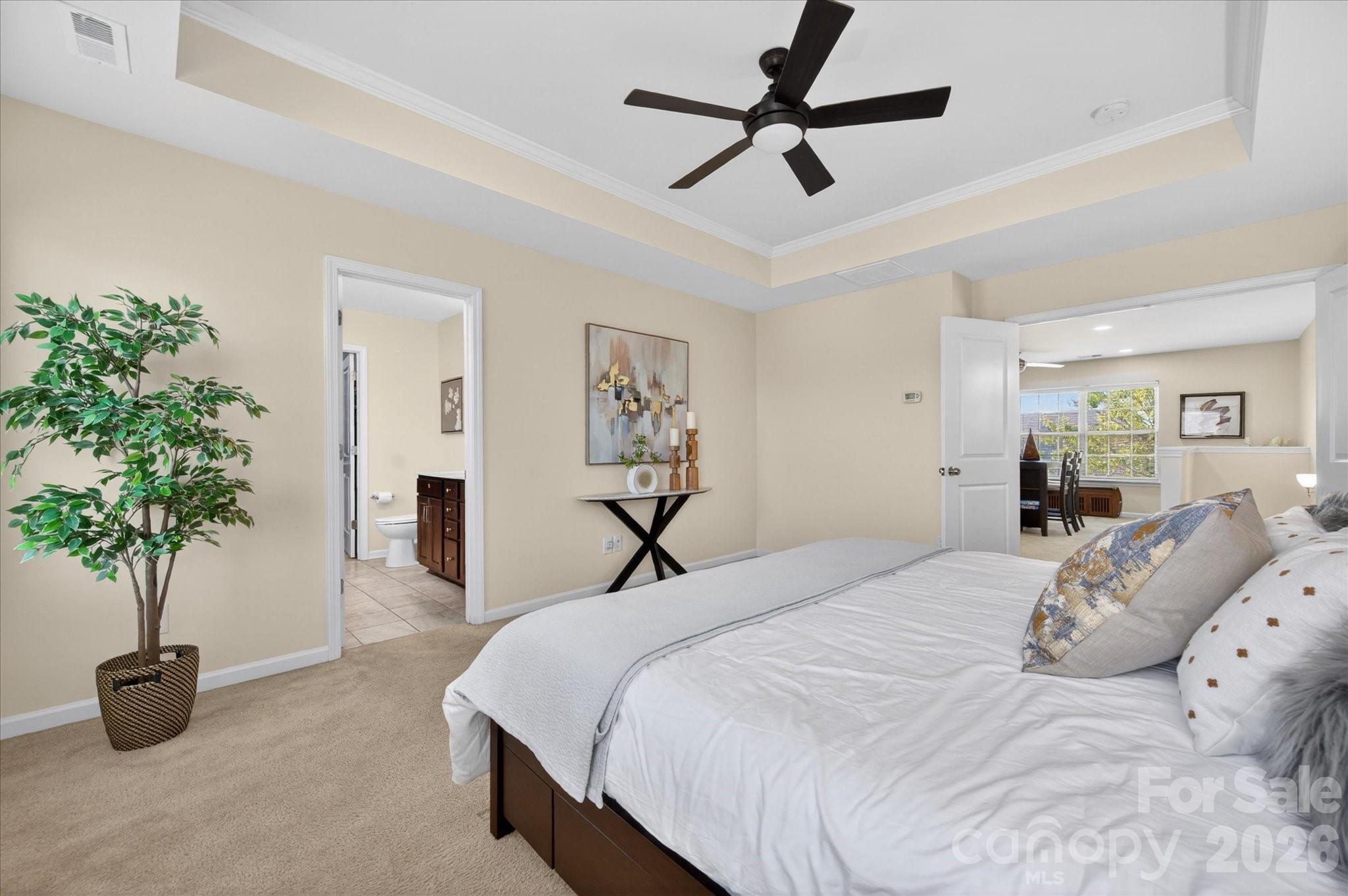 2032 Pinyon Lane Lancaster, SC 29720 - Photo 28 of 44 a bedroom with a bed and a chandelier