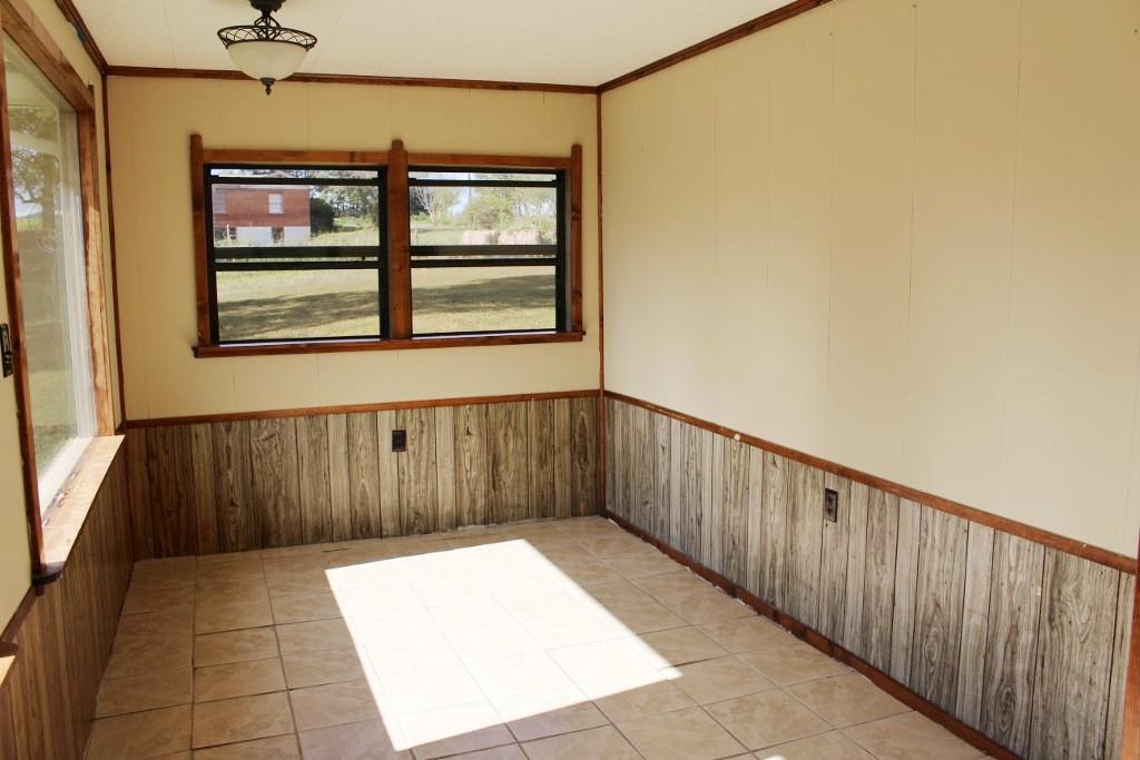 4835 Bonbrook Mill Road Boones Mill, VA 24065 - Photo 6 of 25 Sunroom/Dining Area