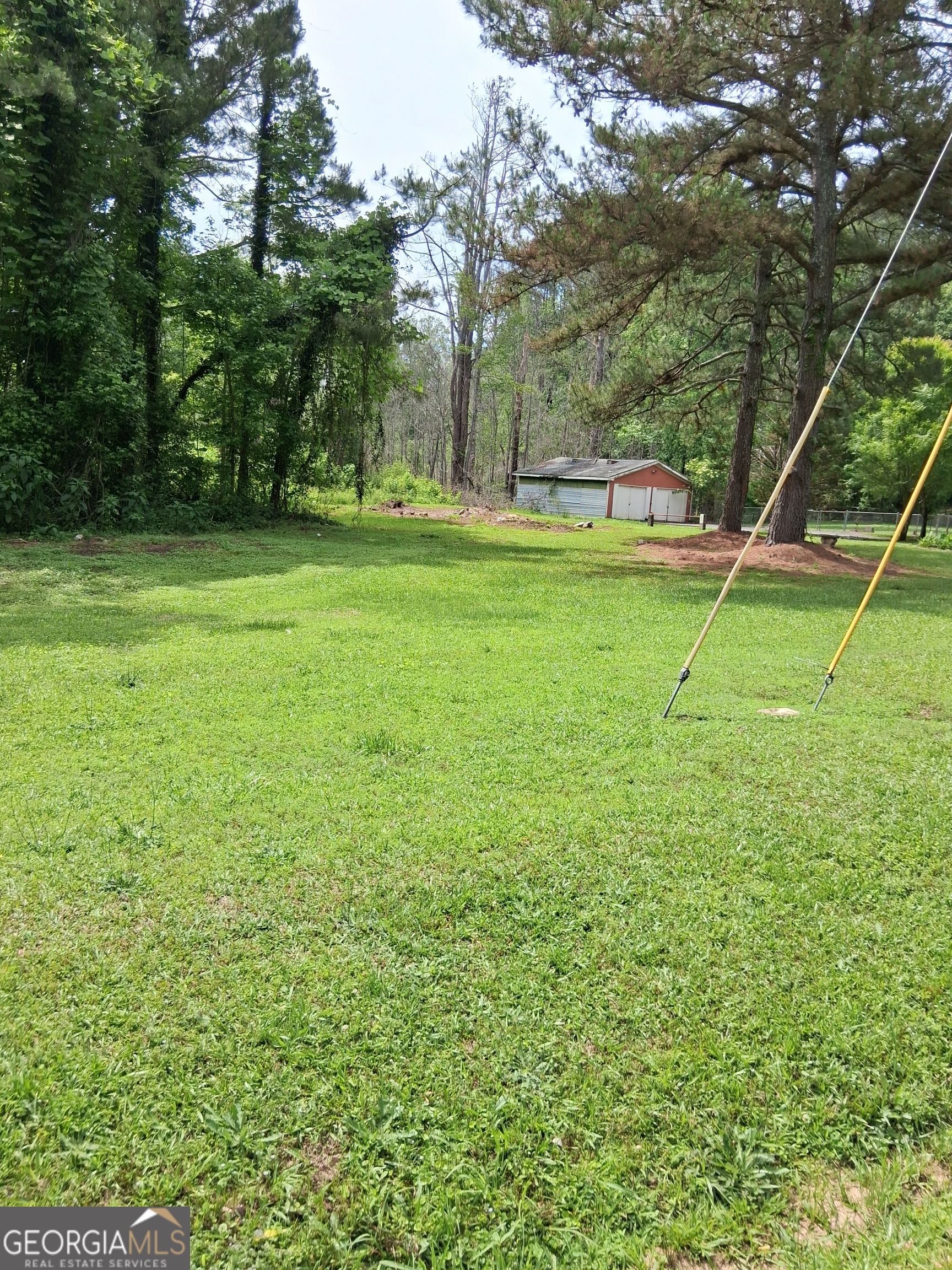 2067 Ebenezer Road Southwest Conyers, GA 30094 - Photo 3 of 3 a view of green field
