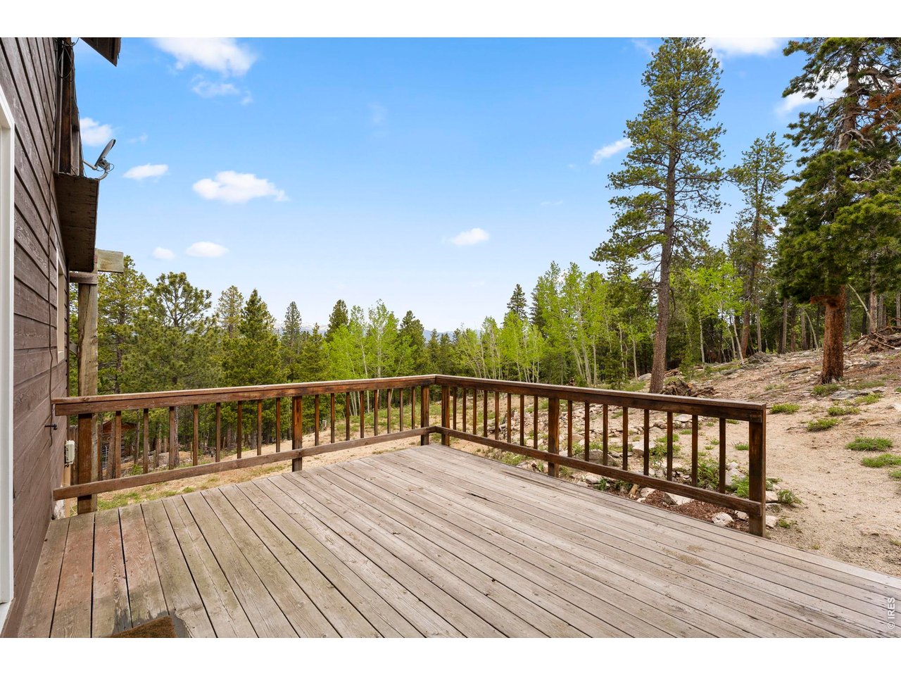 109 Cutforth Road Black Hawk, CO 80422 - Photo 8 of 40 Main level rear deck perfect for bbq's and entertaining