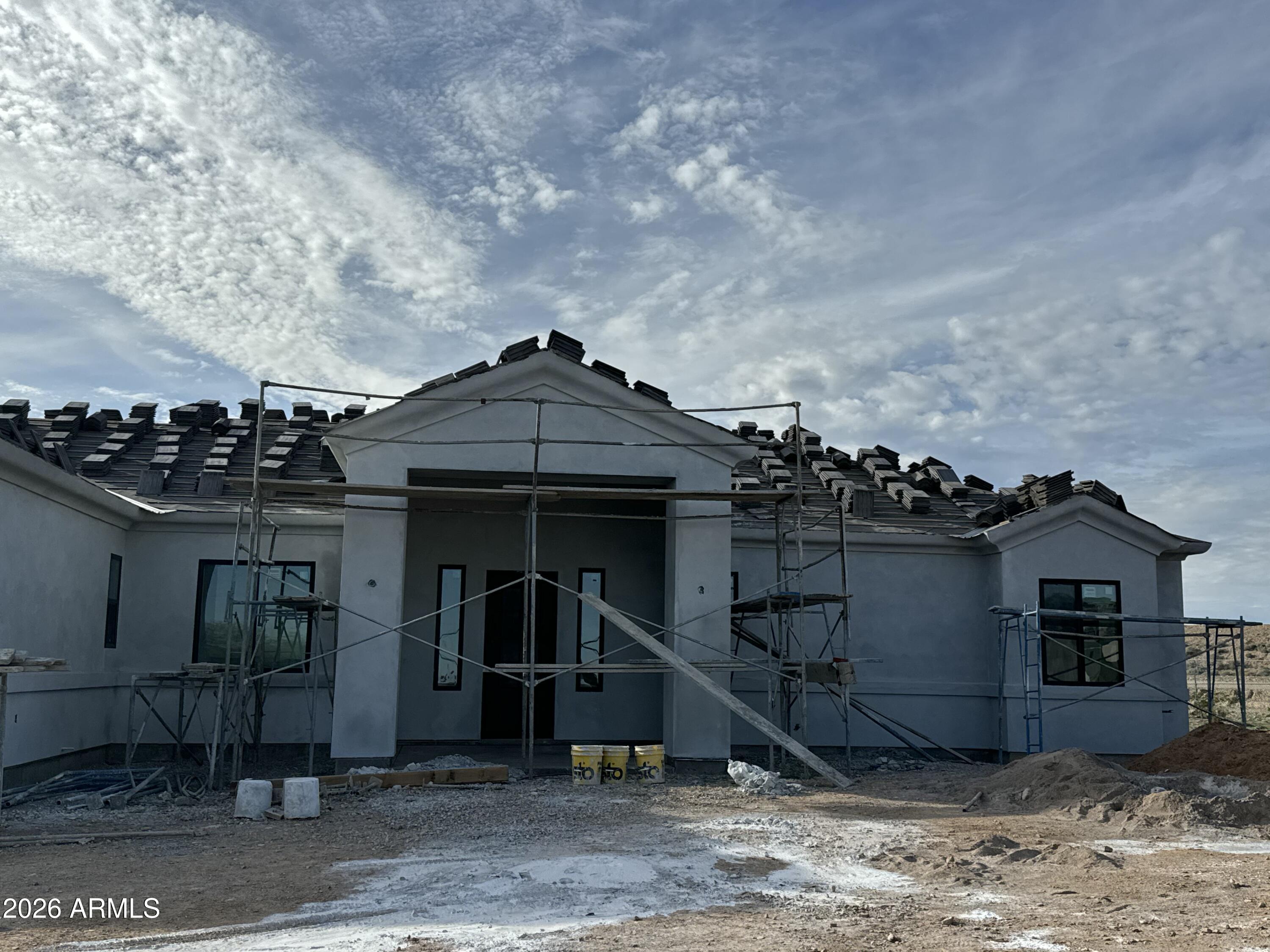 15728 West Montgomery Road Surprise, AZ 85387 - Photo 4 of 19 a front view of a house