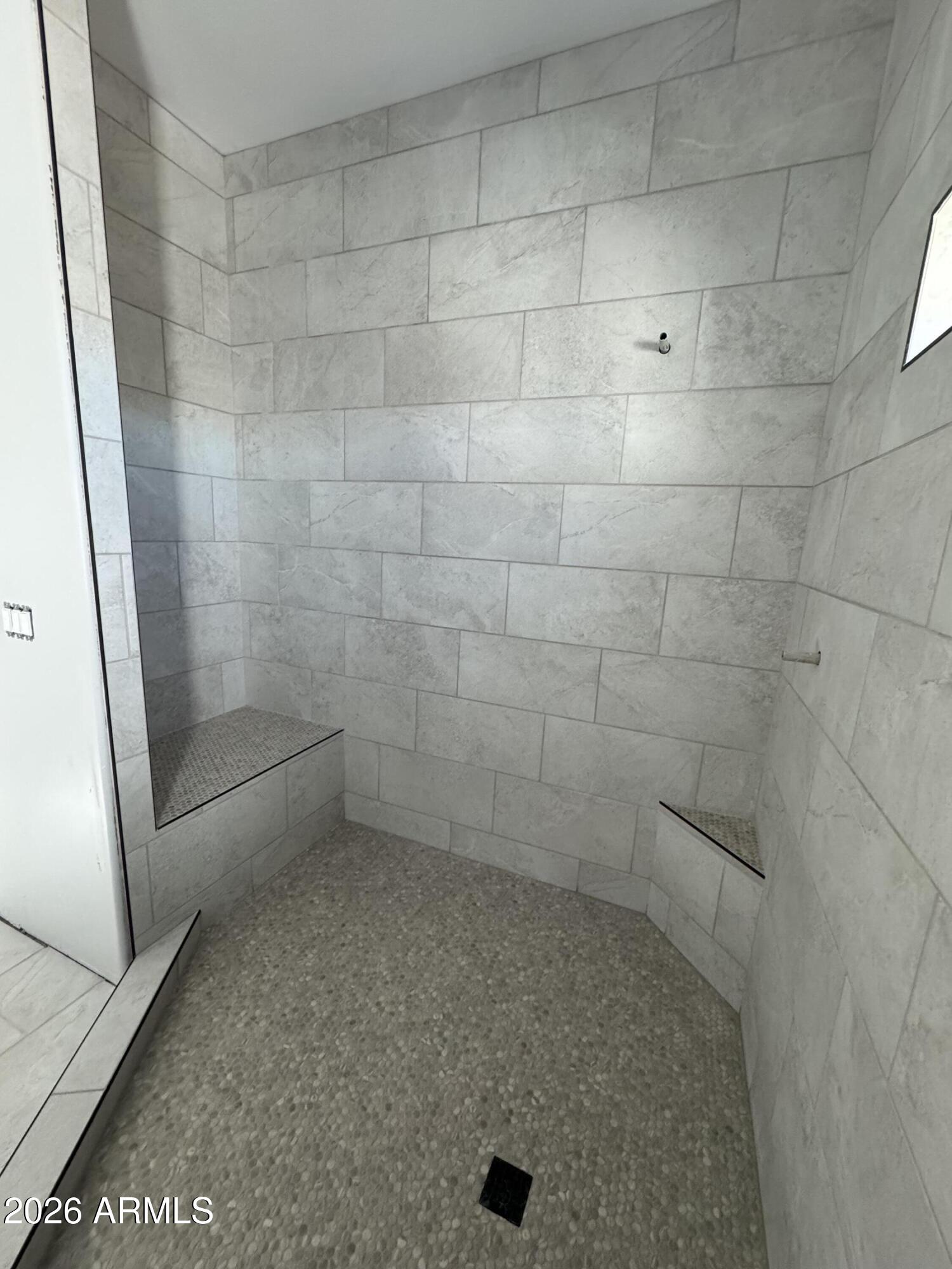 15728 West Montgomery Road Surprise, AZ 85387 - Photo 10 of 19 a bathroom with a shower