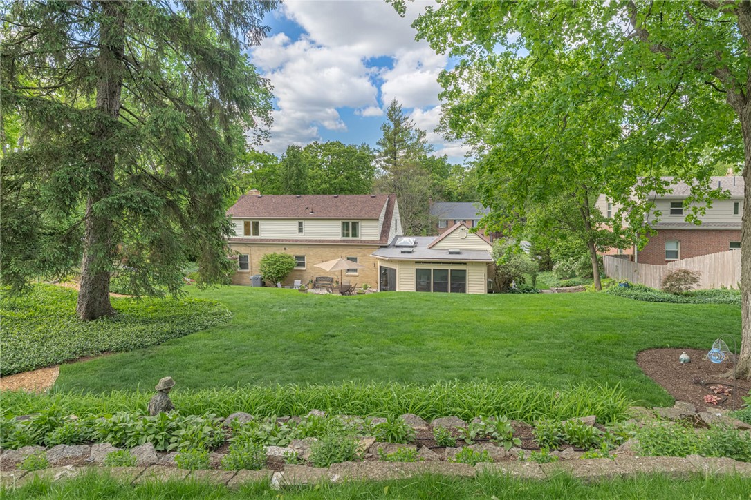 156 West Hadley Road Dayton, OH 45419 - Photo 53 of 71 Expansive green lawn and mature trees provide a private, serene backyard oasis.