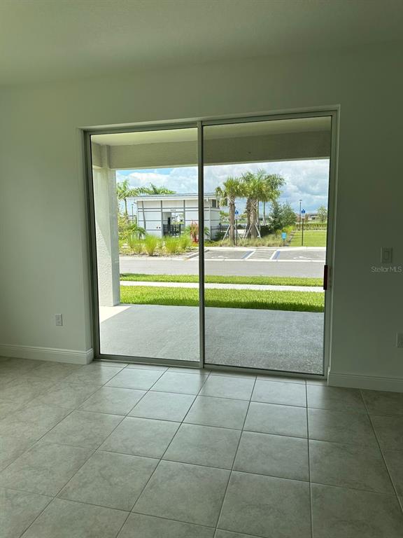 19044 Blueleaf Street Orlando, FL 32827 - Photo 13 of 42 a view of a room that has a window