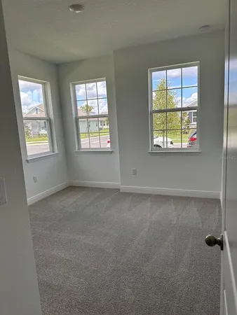 an empty room with windows