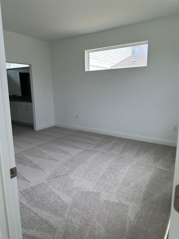 19044 Blueleaf Street Orlando, FL 32827 - Photo 21 of 42 a view of a room with a projector