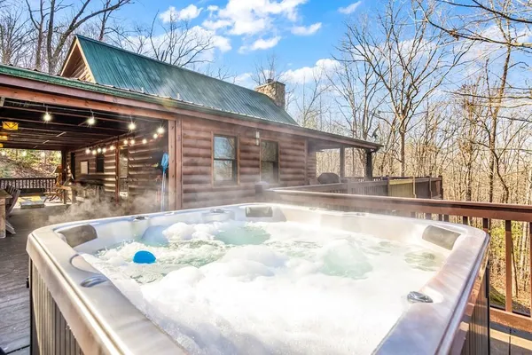 a view of a patio with a yard