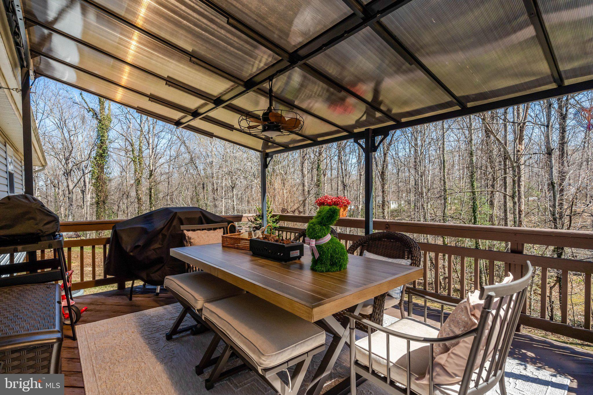 8585 Short Street Manassas, VA 20112 - Photo 25 of 31 a view of a dining room with furniture window and outside view