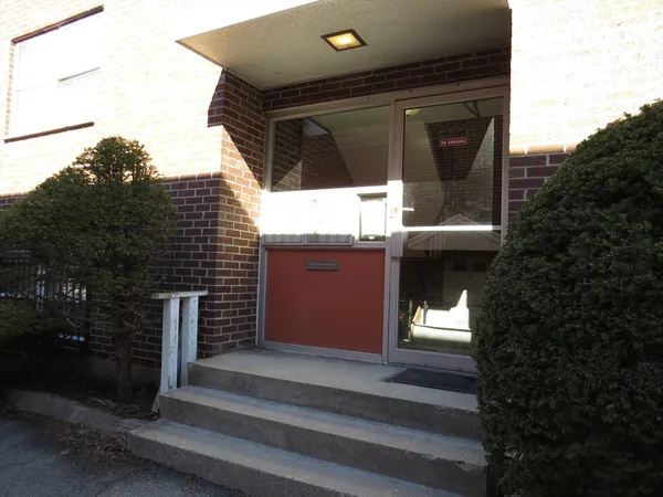 a front view of a house with a garage