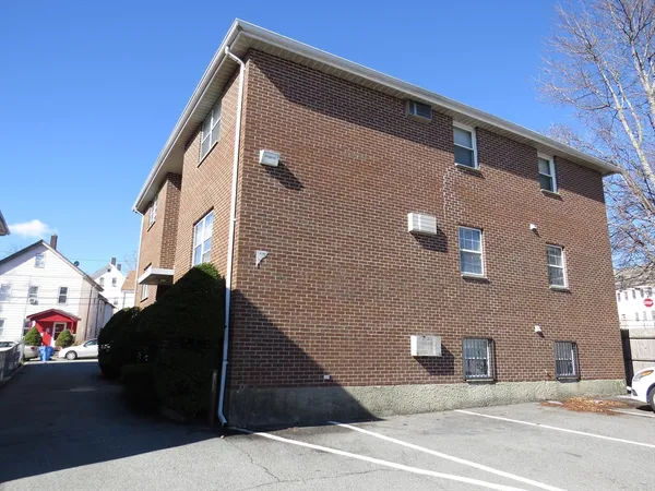 a view of a building with a street