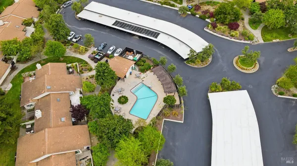 an aerial view of a house patio and outdoor seating