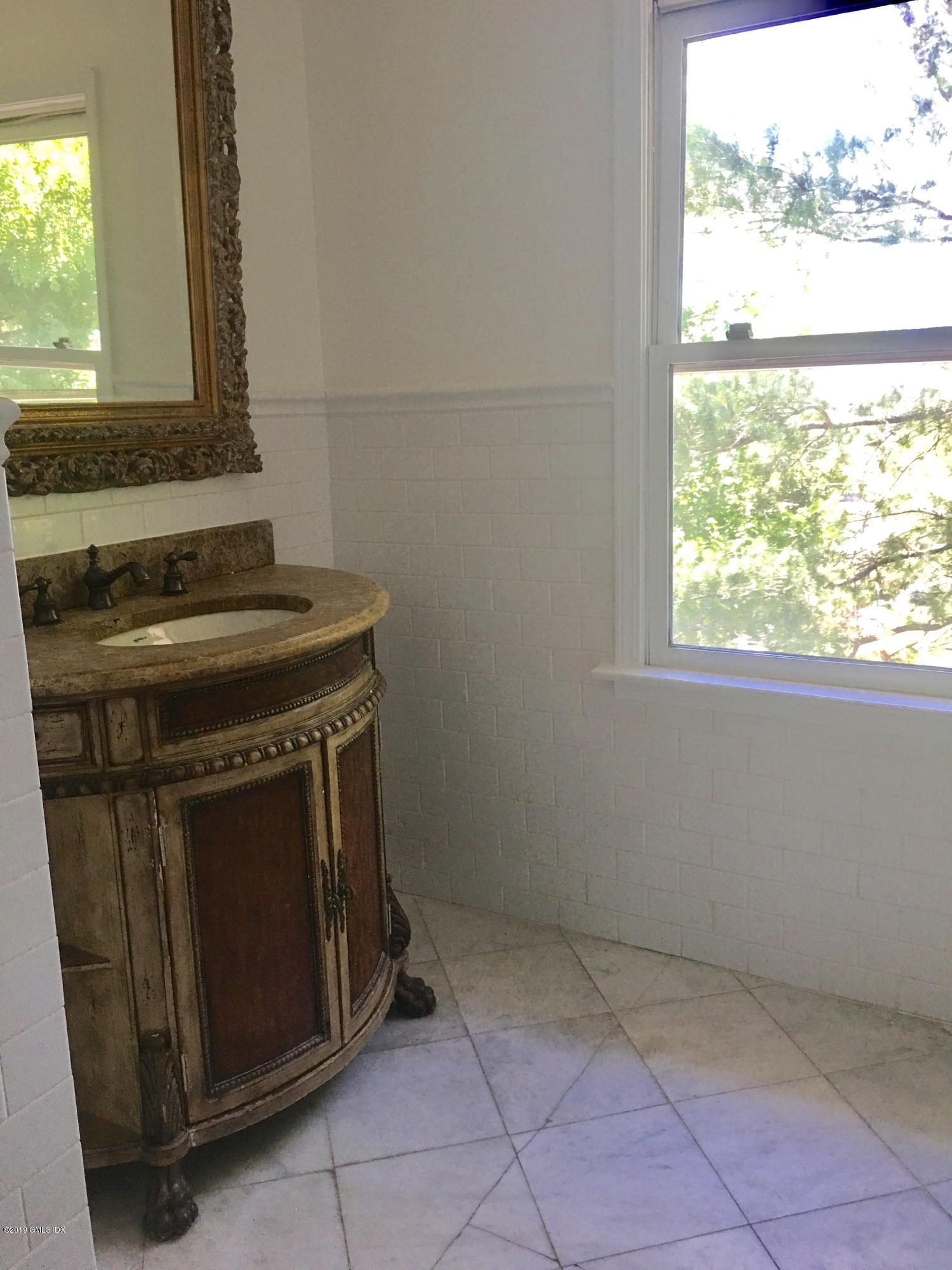16 Ritch Avenue, Unit B Greenwich, CT 06830 - Photo 9 of 12 a utility room with washer and dryer