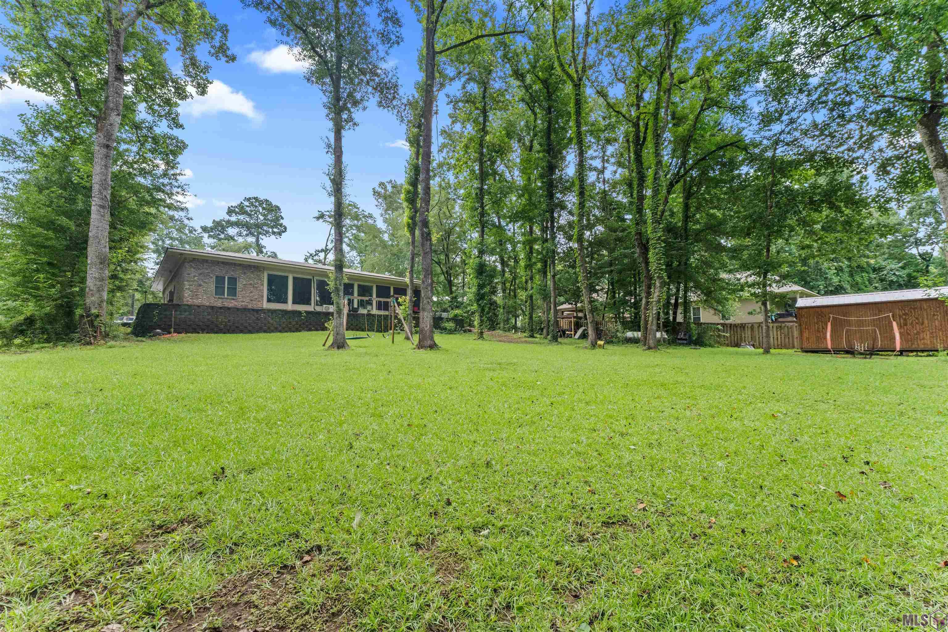 8733 Island Road St. Francisville, LA 70775 - Photo 3 of 35 Back with storage shed