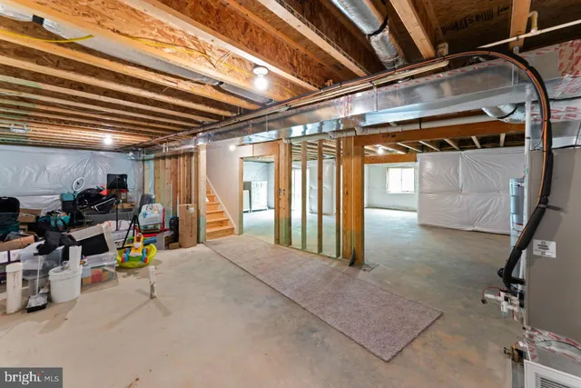 a view of empty room with stairs