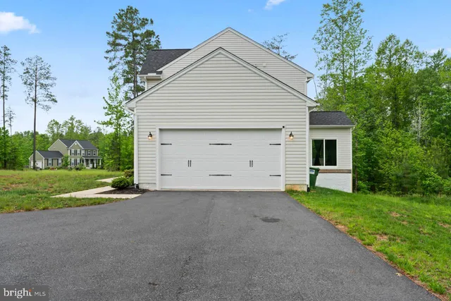 a house view with a garden space