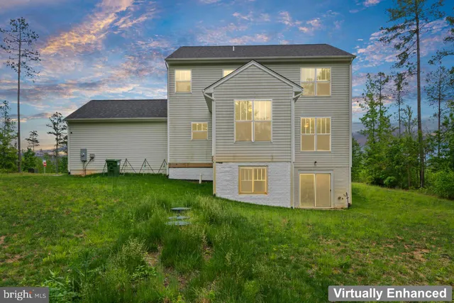 a picture of a bench in front of a house