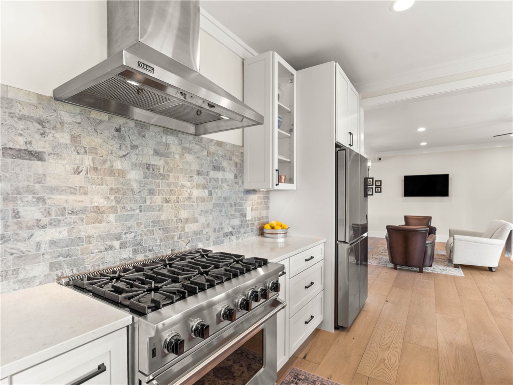 331 Bakerville Road Easley, SC 29642 - Photo 11 of 43 This sleek kitchen features high-end appliances, clean lines, and an open concept layout.