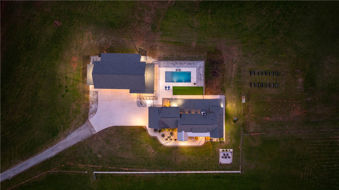 331 Bakerville Road Easley, SC 29642 - Photo 2 of 43 An aerial perspective showcases the inviting outdoor living spaces and expansive grounds.