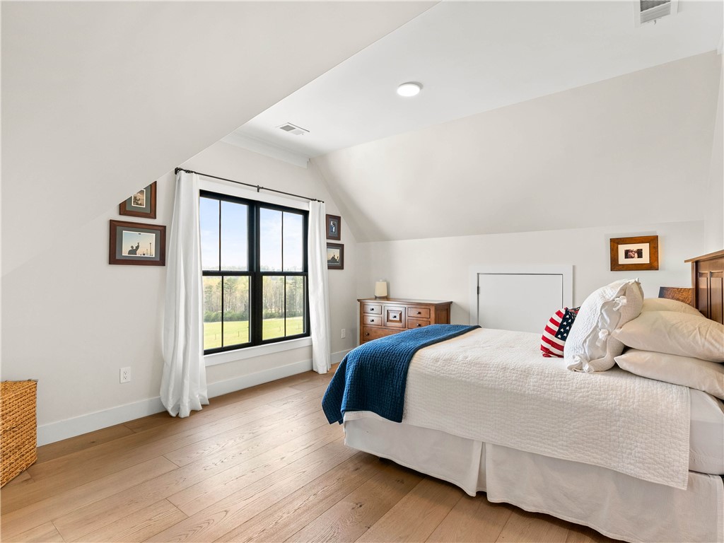 331 Bakerville Road Easley, SC 29642 - Photo 28 of 43 This serene bedroom offers a tranquil retreat with ample natural light and expansive views.