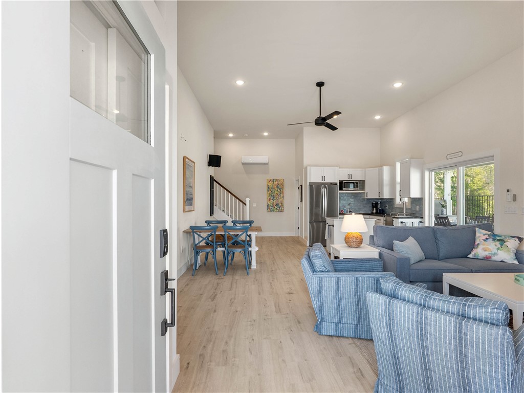 331 Bakerville Road Easley, SC 29642 - Photo 32 of 43 This airy open-concept living space features a kitchen, dining area, and living room.