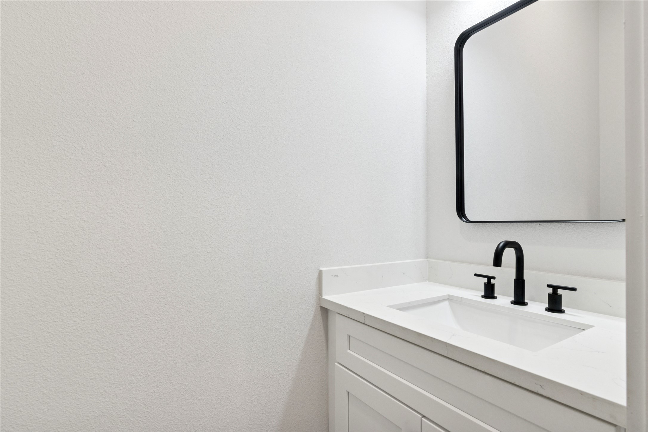 5766 Ward Bend Road Sealy, TX 77474 - Photo 34 of 45 a bathroom with a sink and a mirror