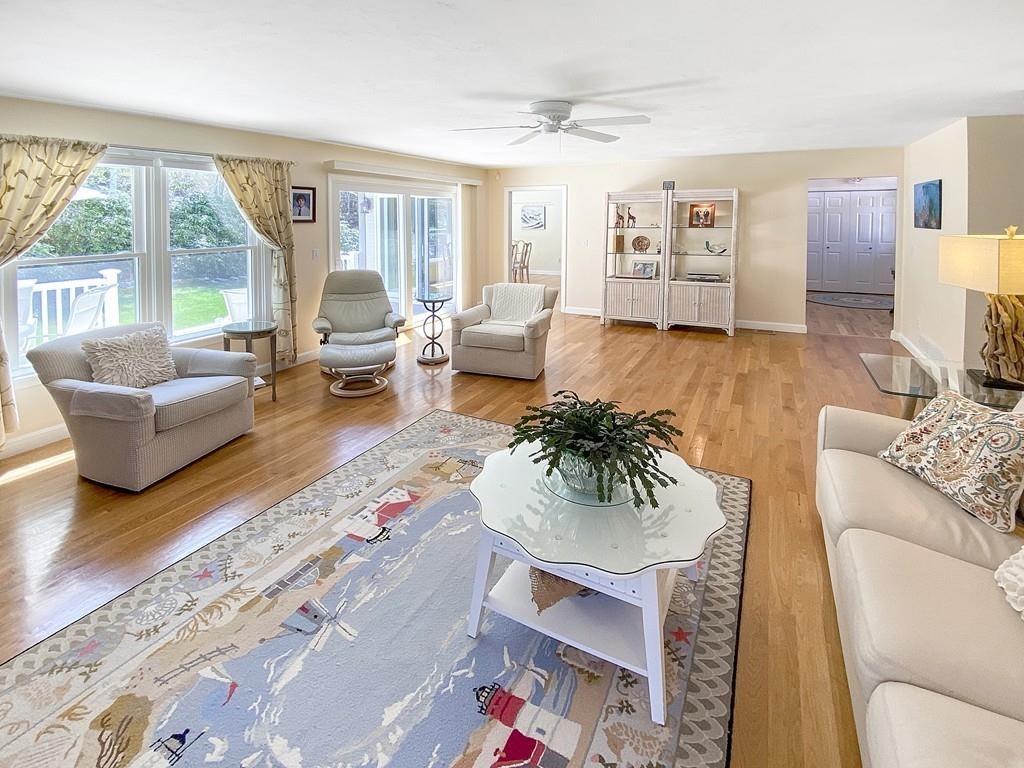 10 Weather Deck Road Bourne, MA 02532 - Photo 12 of 37 a living room with furniture and a large window