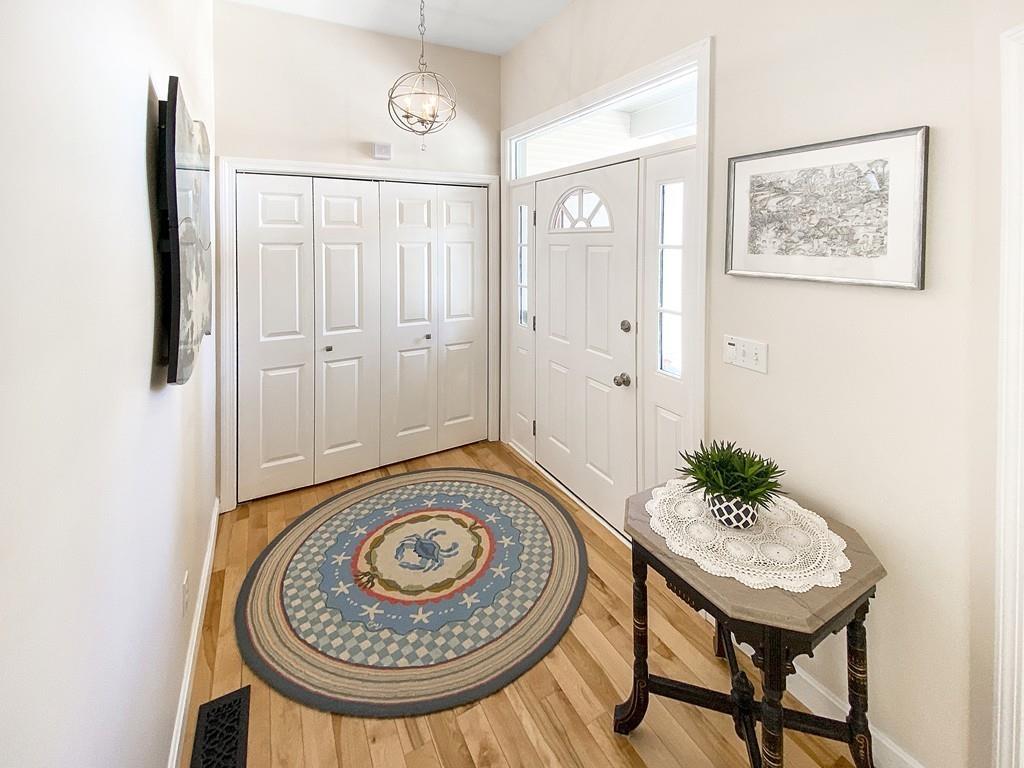 10 Weather Deck Road Bourne, MA 02532 - Photo 16 of 37 a view of a hallway with seating area