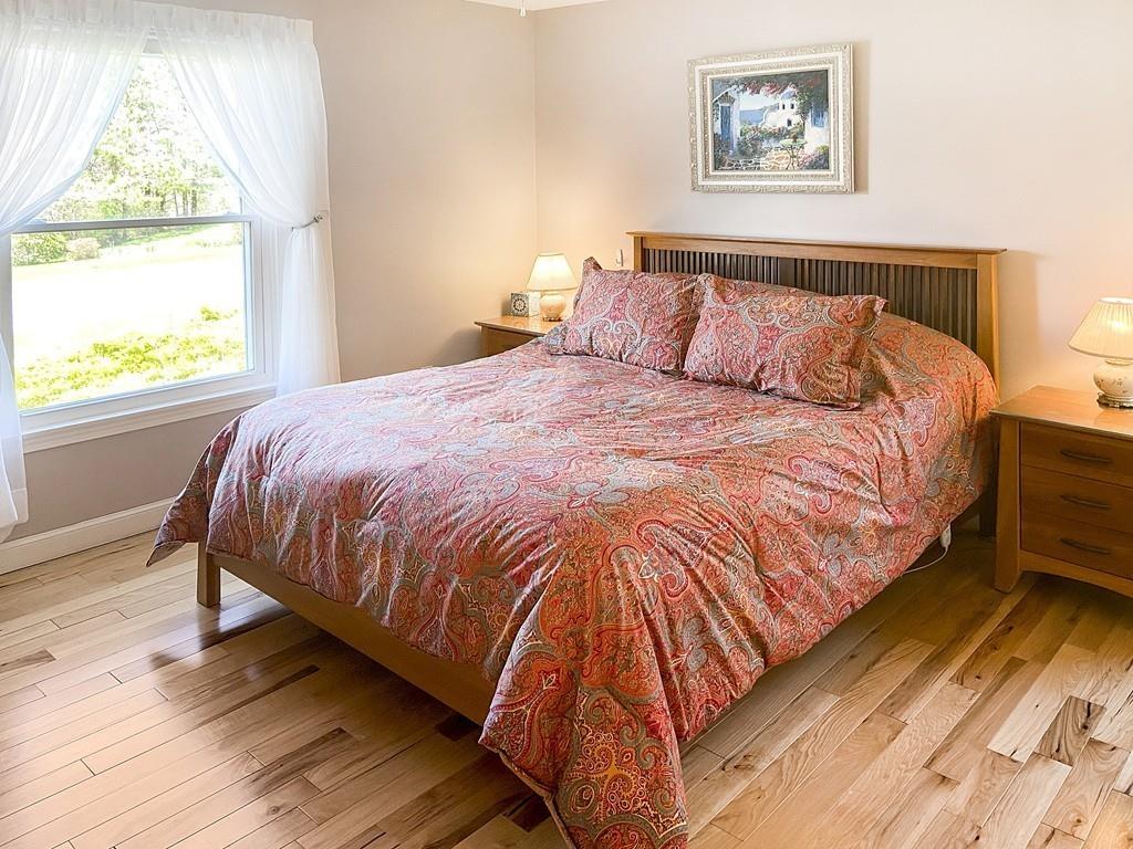 10 Weather Deck Road Bourne, MA 02532 - Photo 19 of 37 a bedroom with a bed and window