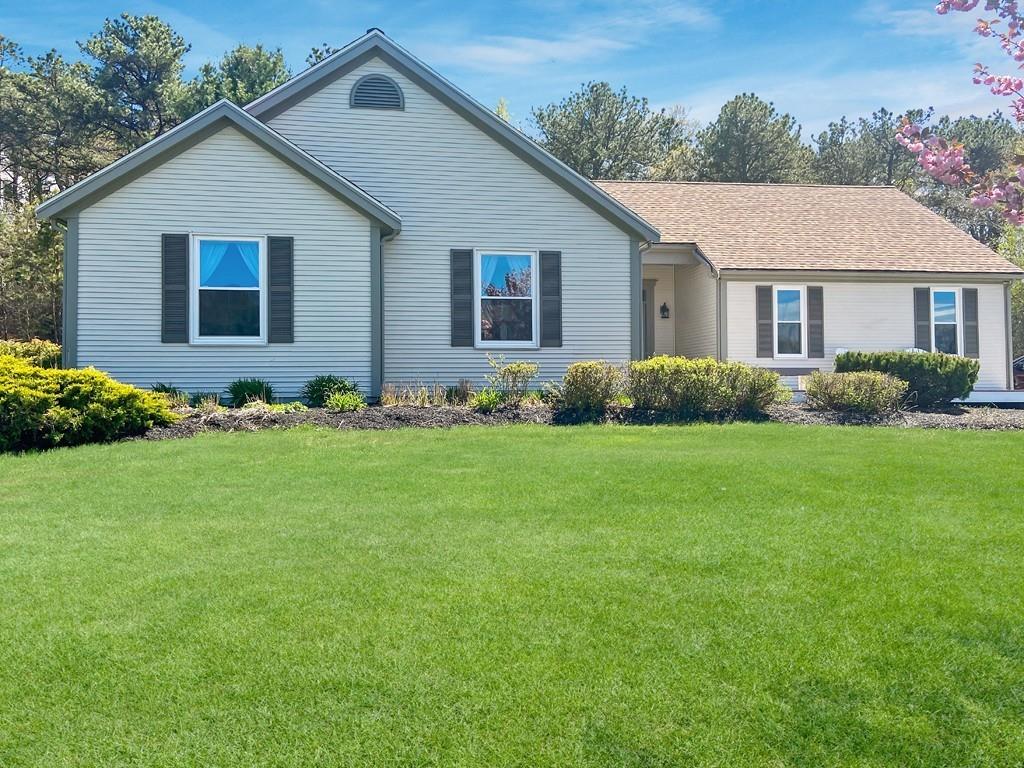 10 Weather Deck Road Bourne, MA 02532 - Photo 27 of 37 a front view of a house with garden