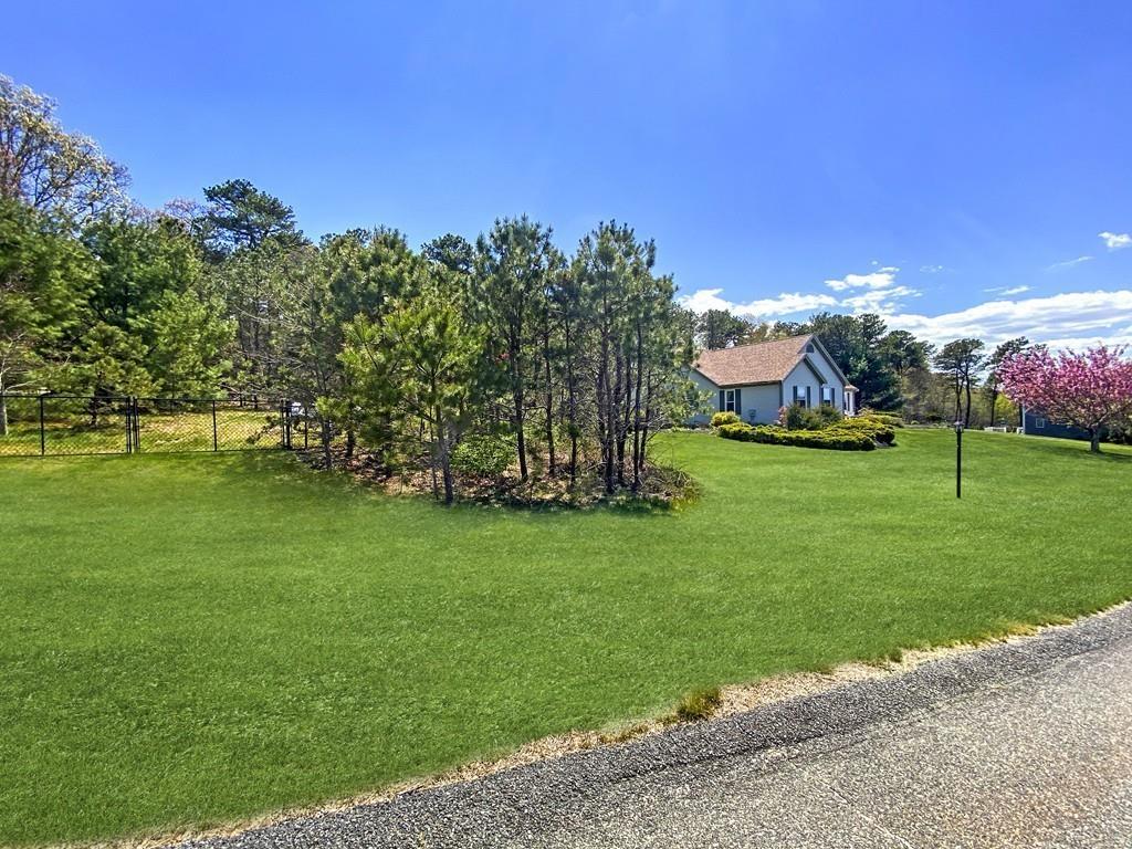 10 Weather Deck Road Bourne, MA 02532 - Photo 28 of 37 a view of a park with large trees