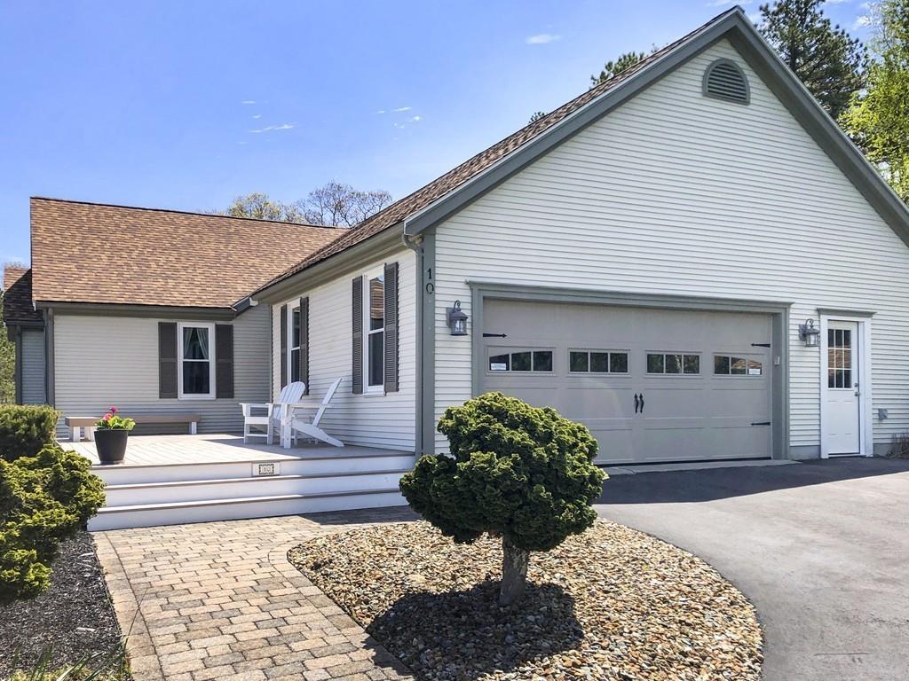10 Weather Deck Road Bourne, MA 02532 - Photo 30 of 37 a front view of a house with garden