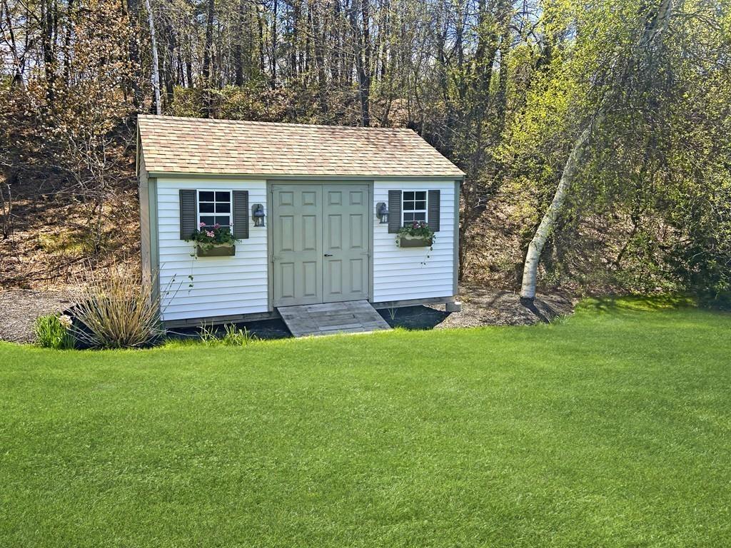 10 Weather Deck Road Bourne, MA 02532 - Photo 35 of 37 a view of a house with backyard