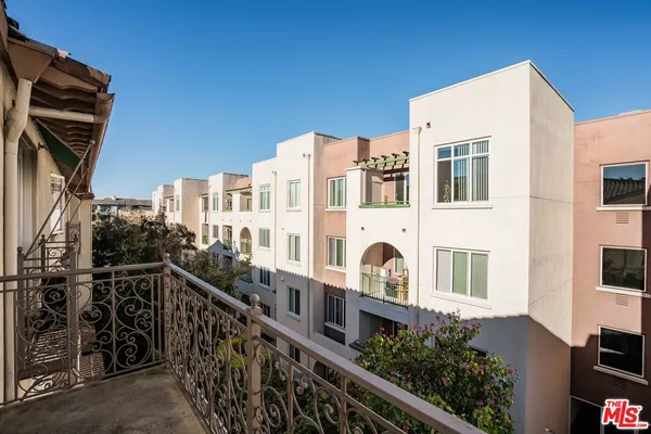 a view of a building from a balcony