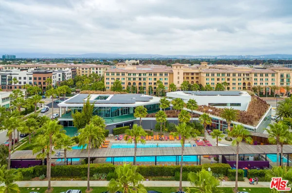 a view of building with an outdoor space and lakeside