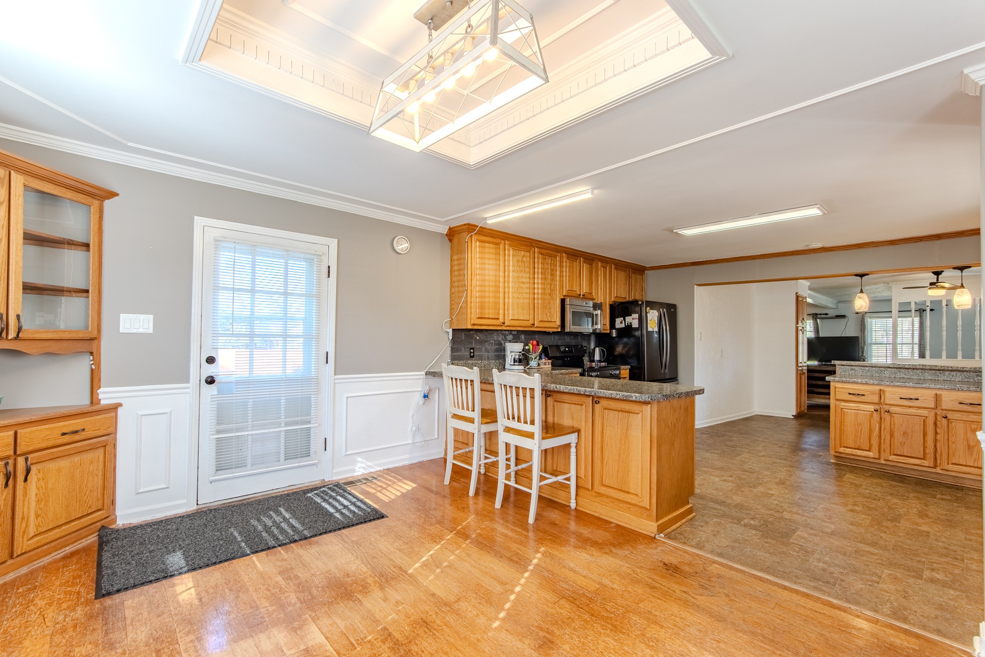 404 Highway 57 Ramer, TN 38367 - Photo 12 of 87 a living room with stainless steel appliances kitchen island granite countertop furniture and a kitchen view