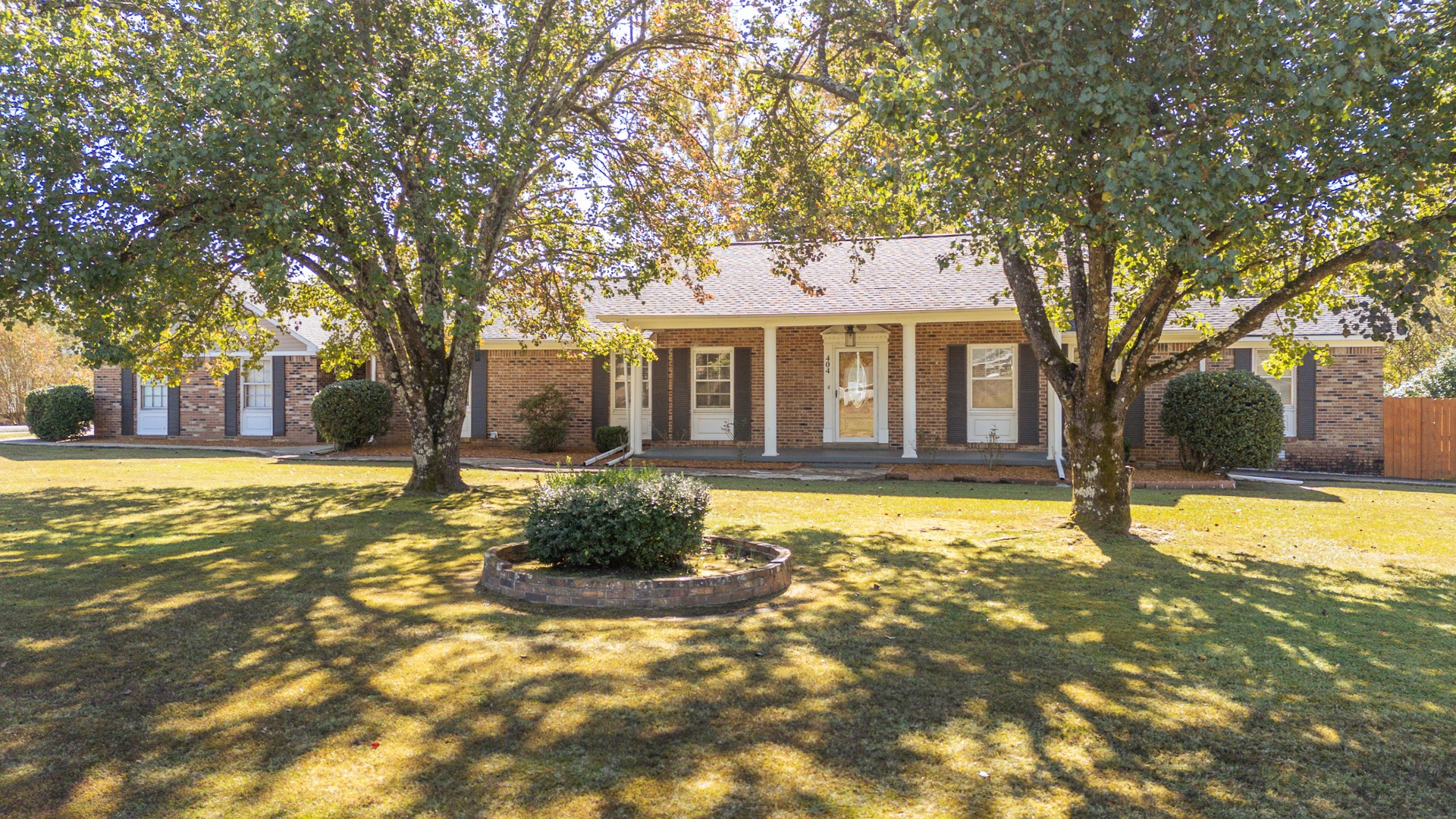 404 Highway 57 Ramer, TN 38367 - Photo 2 of 87 a house that has a tree in front of it
