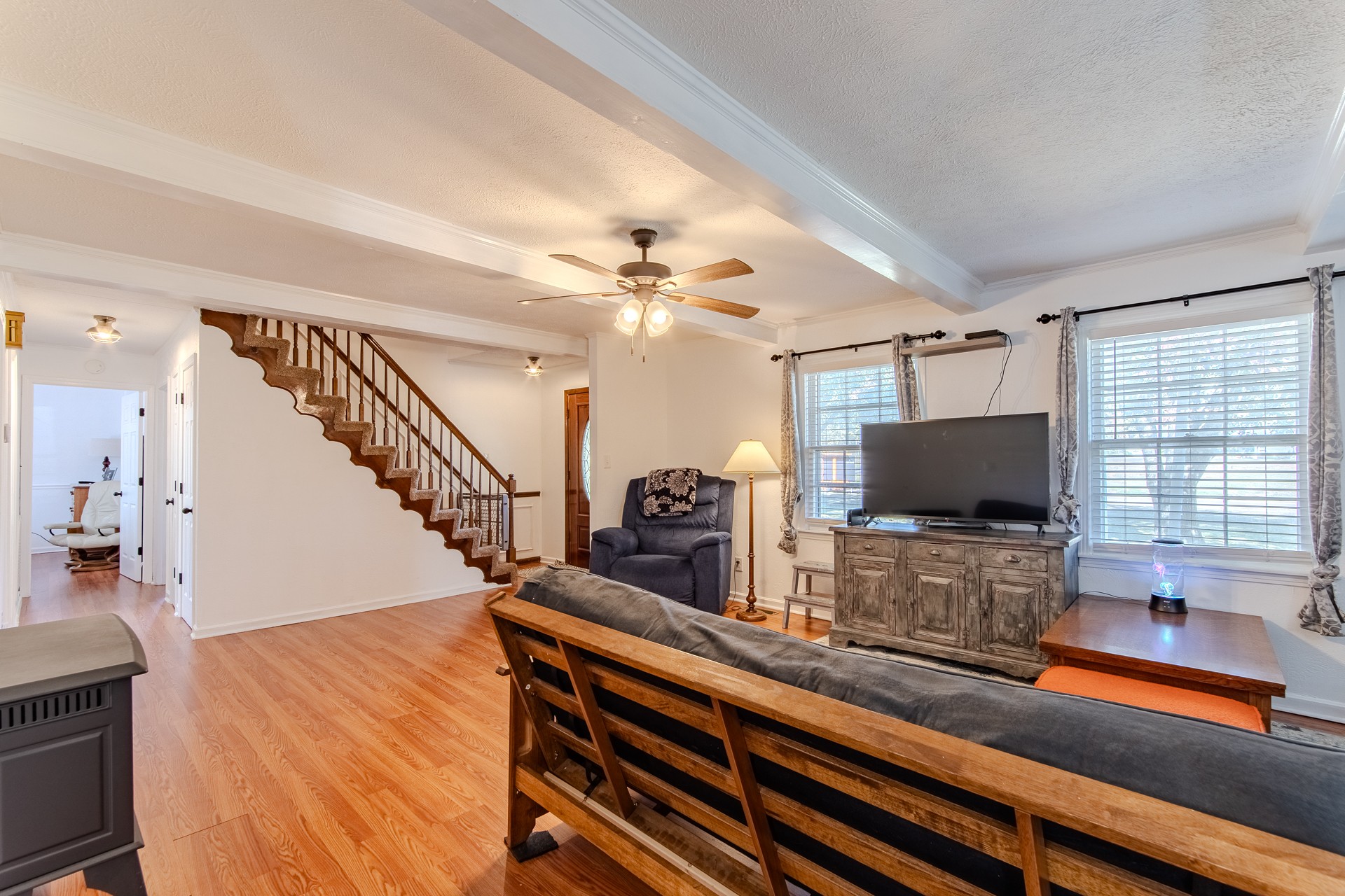 404 Highway 57 Ramer, TN 38367 - Photo 27 of 87 a living room with furniture and a flat screen tv