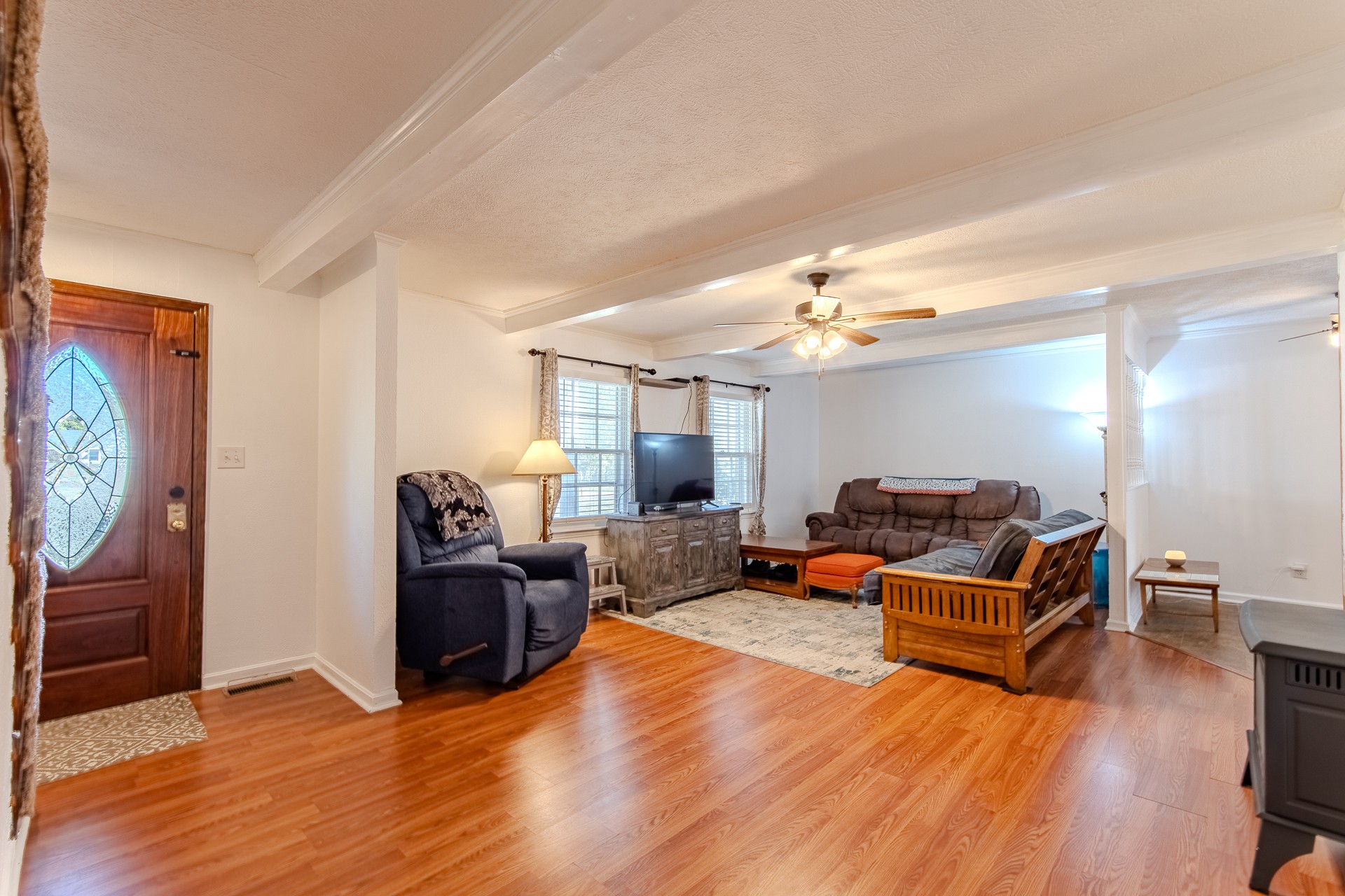 404 Highway 57 Ramer, TN 38367 - Photo 28 of 87 a living room with furniture and a wooden floor