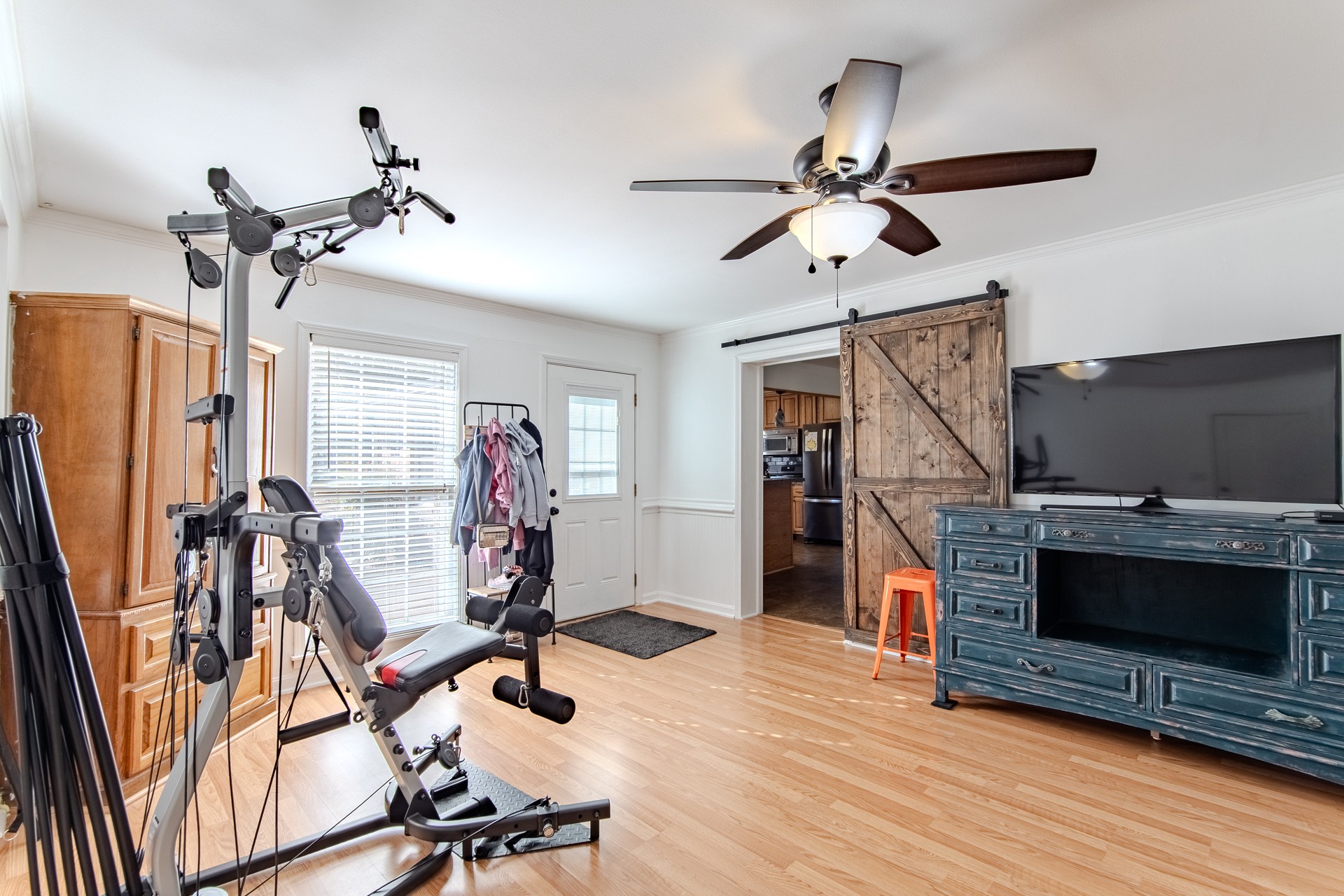 404 Highway 57 Ramer, TN 38367 - Photo 52 of 87 a view of a livingroom with furniture and a flat screen tv