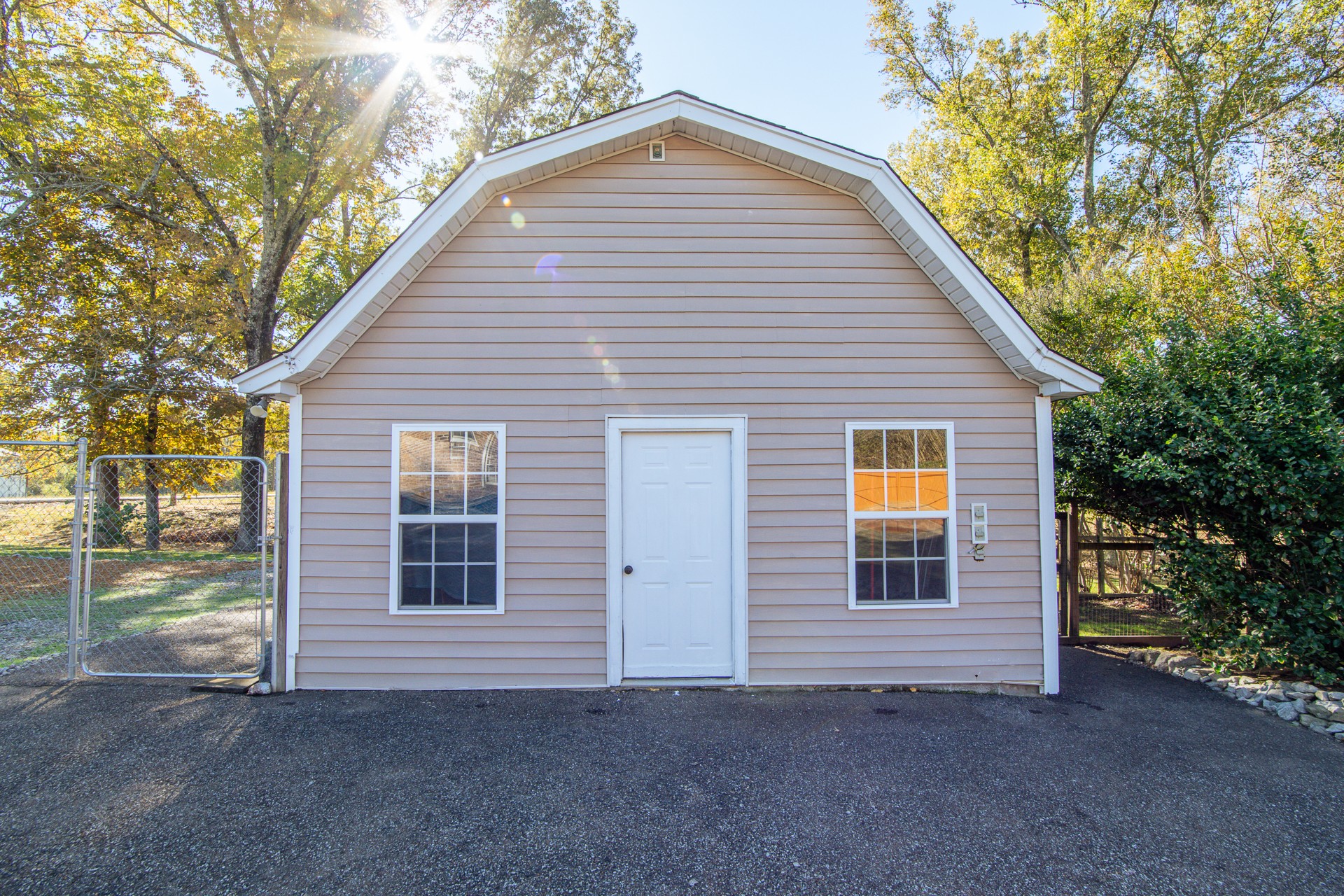 404 Highway 57 Ramer, TN 38367 - Photo 6 of 87 a view of a house with a yard and garage