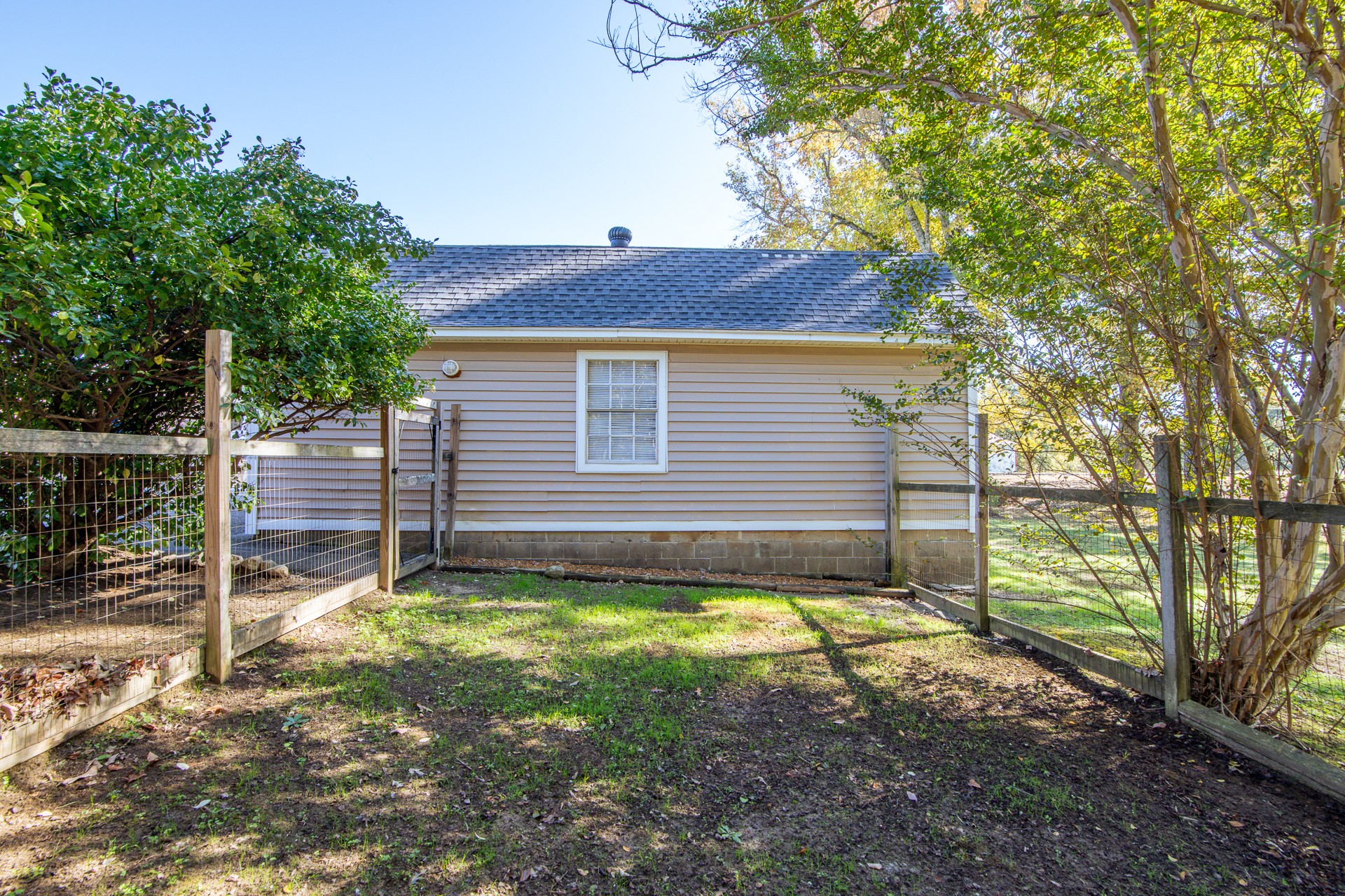 404 Highway 57 Ramer, TN 38367 - Photo 65 of 87 a view of a backyard with a small cabin