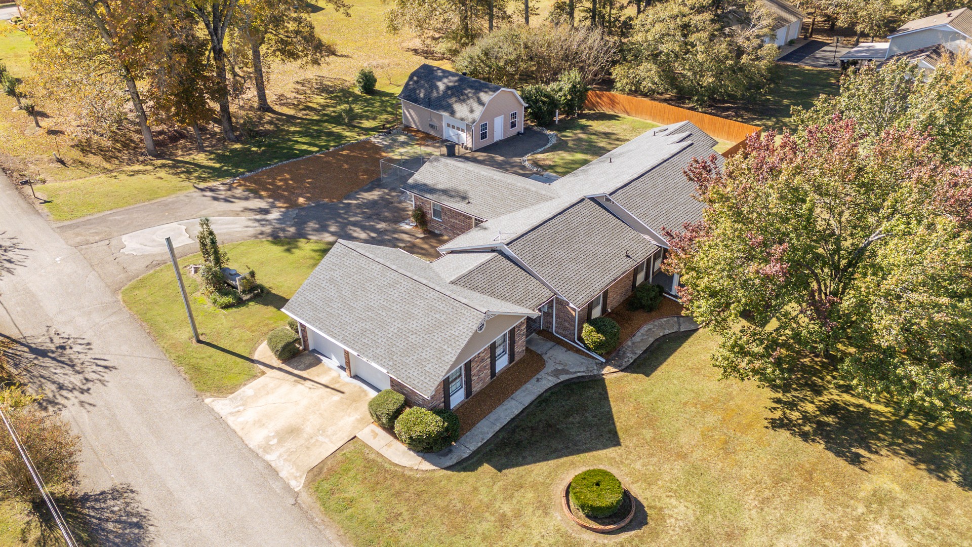 404 Highway 57 Ramer, TN 38367 - Photo 83 of 87 an aerial view of a house with swimming pool and large trees