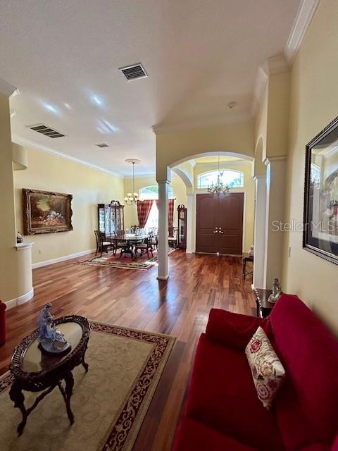 17127 Brown Road Odessa, FL 33556 - Photo 18 of 58 a living room with furniture and a wooden floor