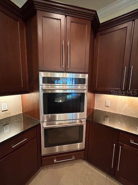 17127 Brown Road Odessa, FL 33556 - Photo 24 of 58 a stove top oven sitting inside of a kitchen