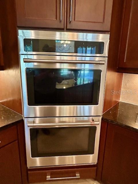 17127 Brown Road Odessa, FL 33556 - Photo 25 of 58 a stove top oven sitting inside of a kitchen