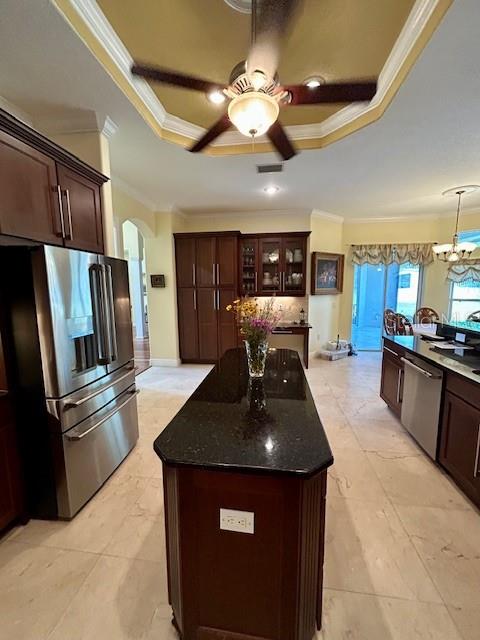 17127 Brown Road Odessa, FL 33556 - Photo 27 of 58 a kitchen with stainless steel appliances granite countertop a sink a stove and refrigerator