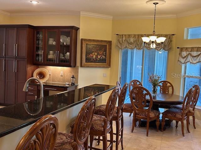 17127 Brown Road Odessa, FL 33556 - Photo 28 of 58 a view of a dining room with furniture