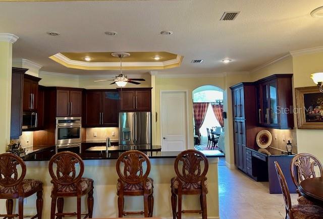 17127 Brown Road Odessa, FL 33556 - Photo 29 of 58 a view of a dining room with furniture and chandelier
